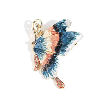 Enamel butterfly brooch with rhinestone details, blue and peach wings, gold pin back