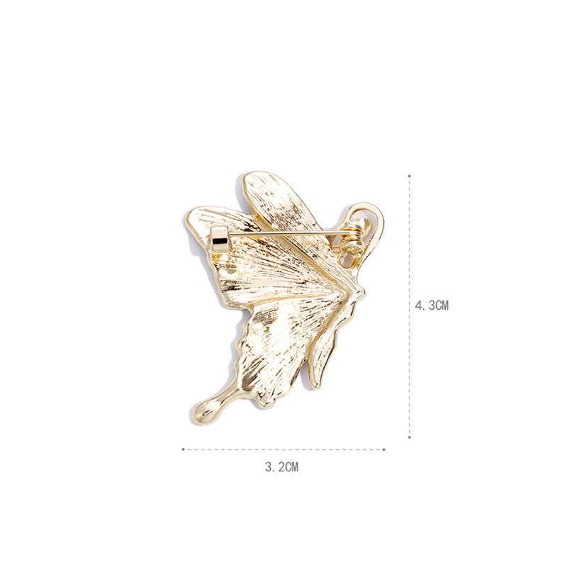 Gold butterfly brooch, size 3.2 x 4.3 cm, enamel wings with rhinestone accents