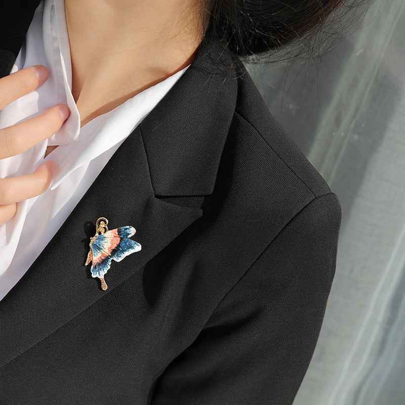 Enamel butterfly brooch with rhinestones, blue wings and gold top loop pin