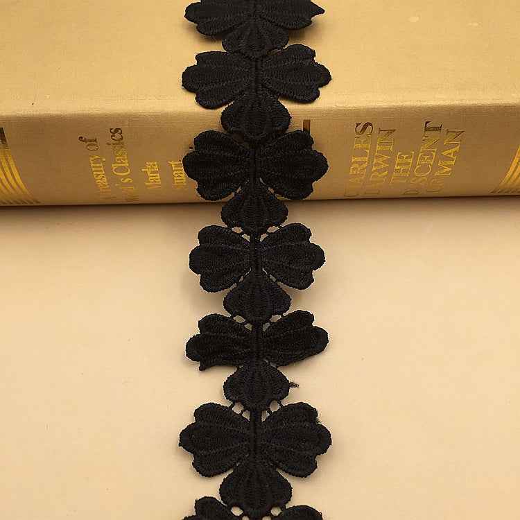 4.3cm floral lace trim, water-soluble embroidery; black flower appliqués on a strip