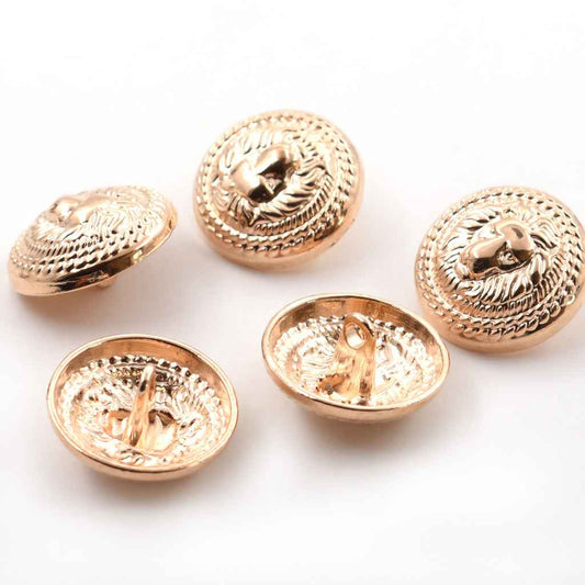 Antique gold British lion head shank buttons, multiple round faces shown