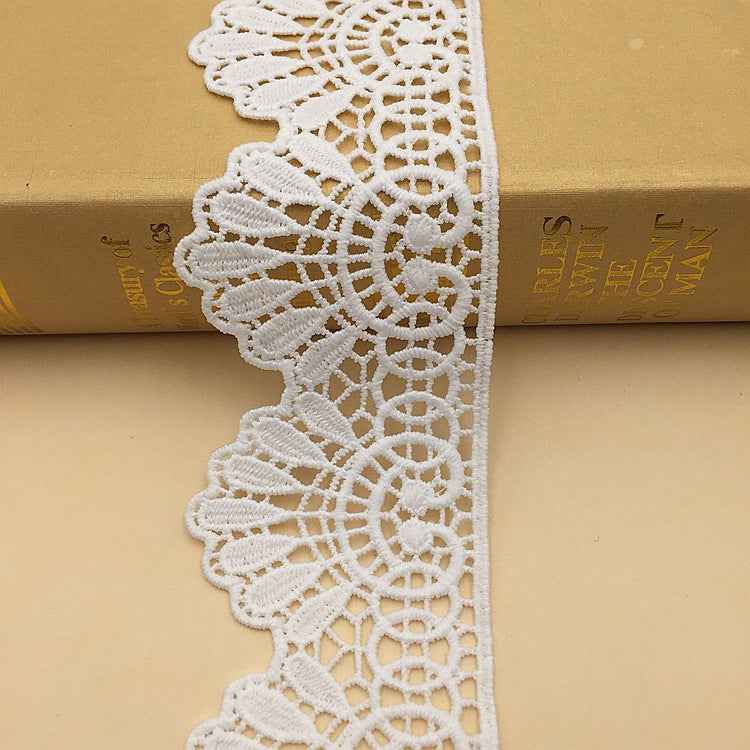 White wave embroidery lace trim, close-up openwork floral lattice