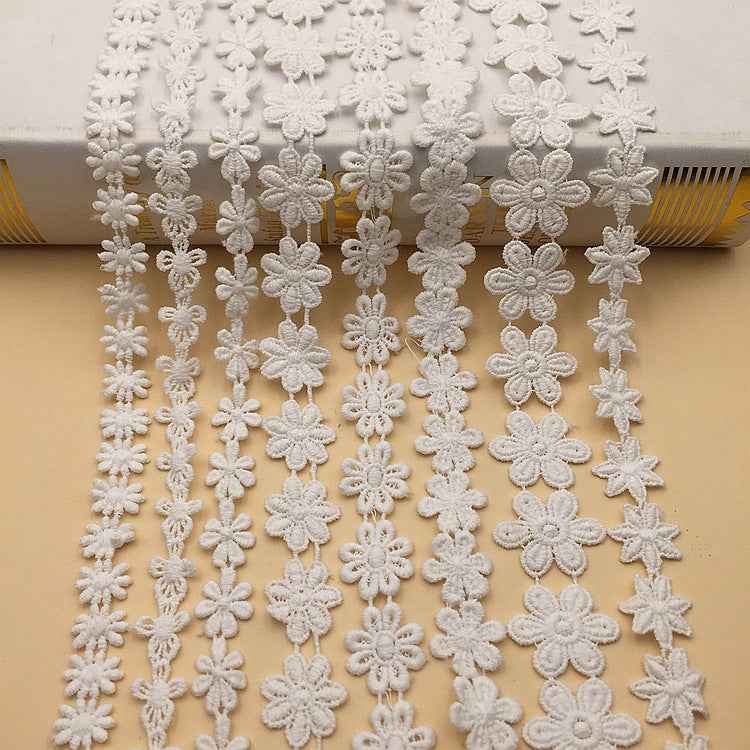 White cotton floral embroidered lace trim with small flower motifs, 10-yard roll