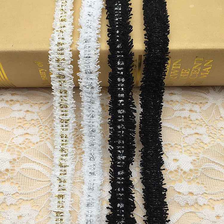 1.5cm metallic fringe trim, white and black lengths with gold-silver thread highlights