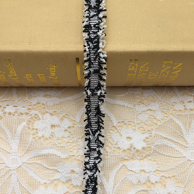 1.5cm metallic fringe trim, black fringe with silver metallic detail and gold accents