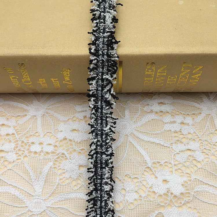 1.5cm metallic fringe trim, black base with silver threads and gold accents