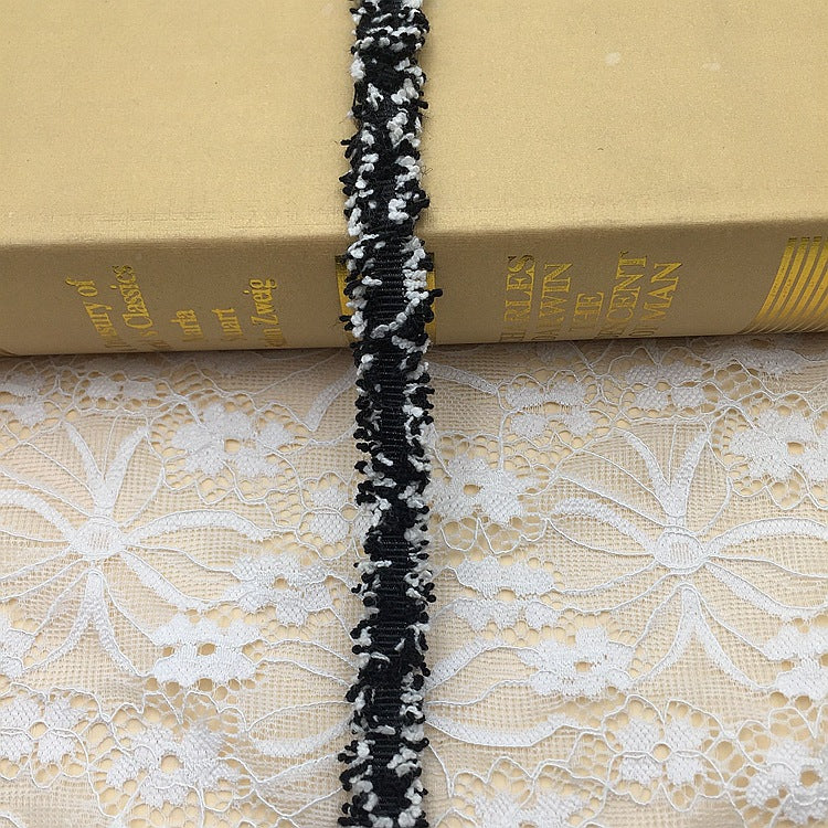 1.5cm metallic fringe trim, black with silver highlights and dense fringe, 20 yards