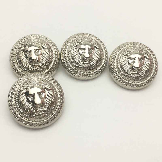 Silver lion head metal shank buttons, round front with carved mane border