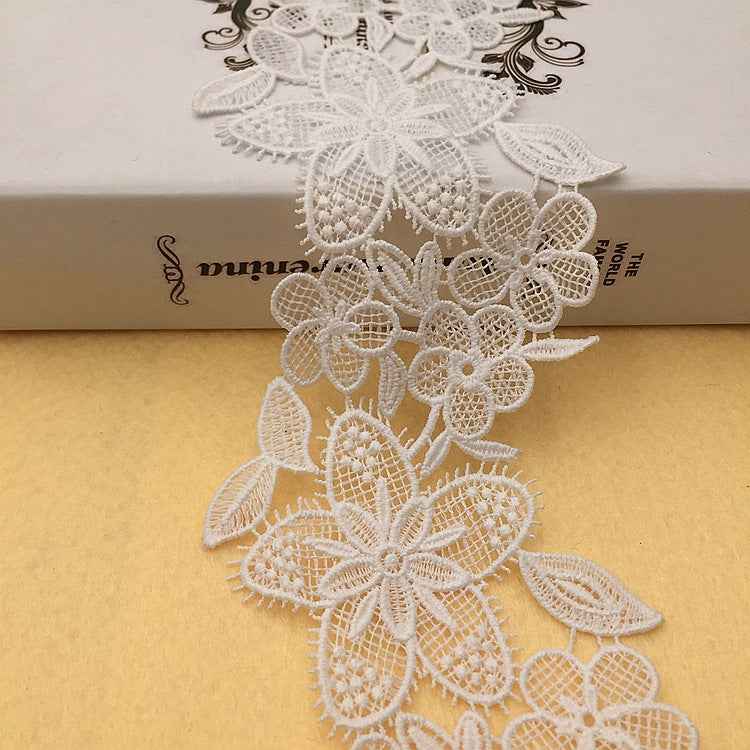 White lace trim, 9.5 cm wide, ornate floral embroidery with petal-like details