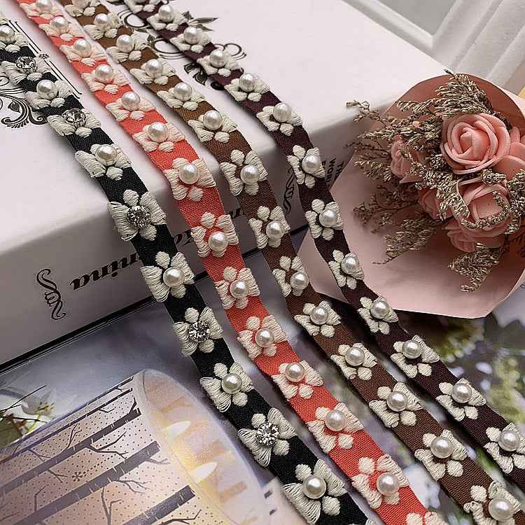 1.5 cm ethnic jacquard lace trim in dark pink with pearl accents and floral bead details