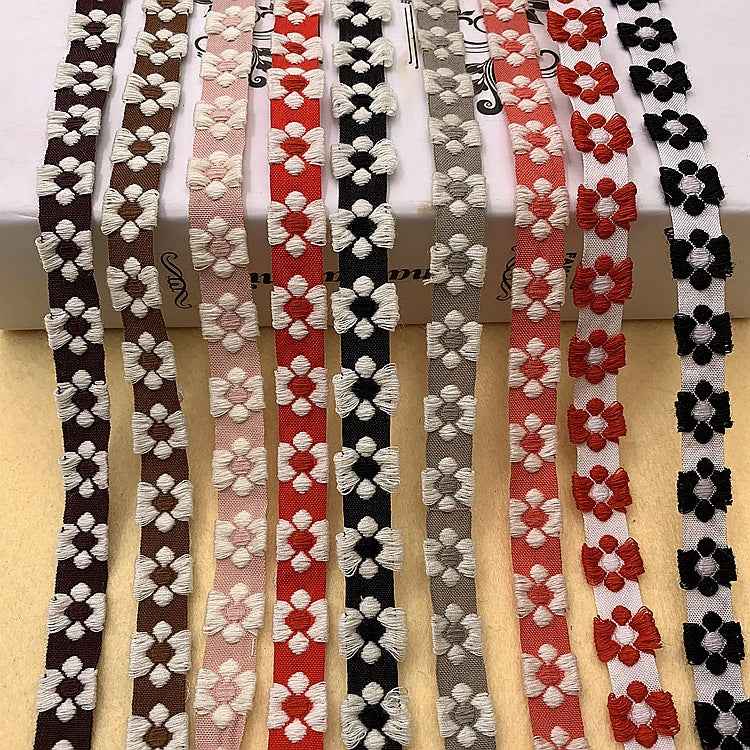 Jacquard-Spitzenband mit Blütenmotiven, mehrfarbig (weiß, rosa, rot, schwarz)