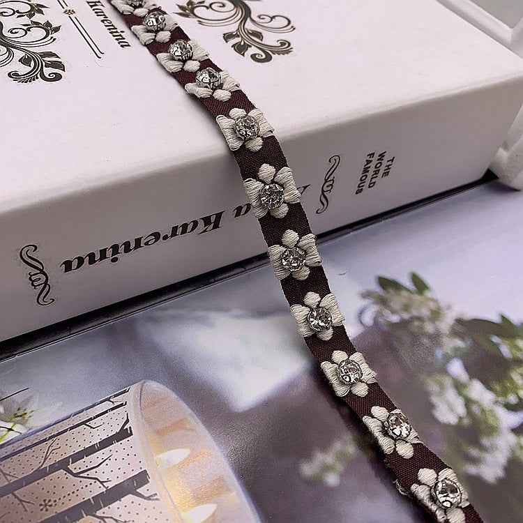Dark 1.5 cm jacquard lace trim with silver glass bead flower details