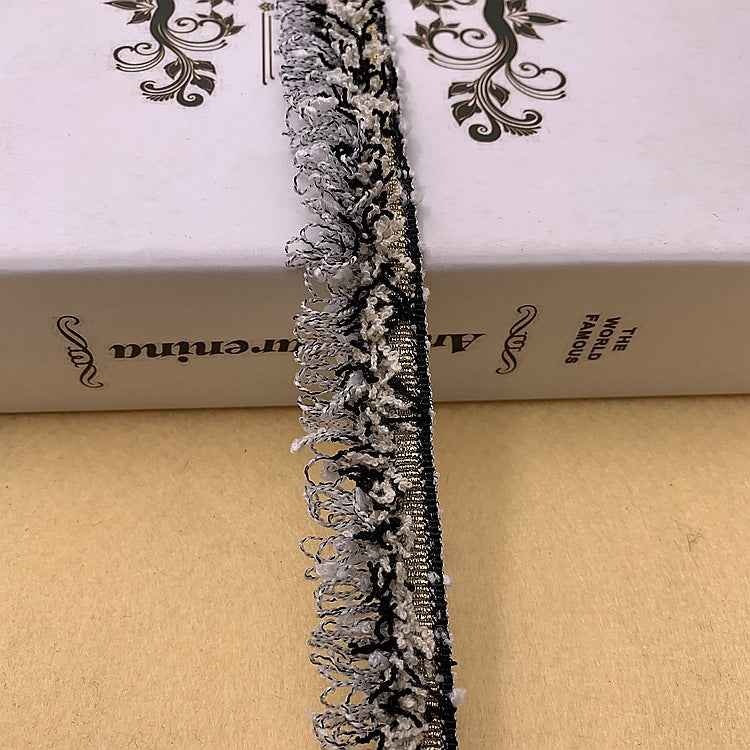 Black-and-white lace fringe trim, detailed braided border