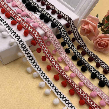 1.5cm pom-pom trim in red, pink, black, and white with braided loops and tiny pom poms