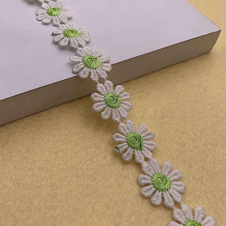 Daisy-petal lace trim in white with light green daisy centers for DIY crafts