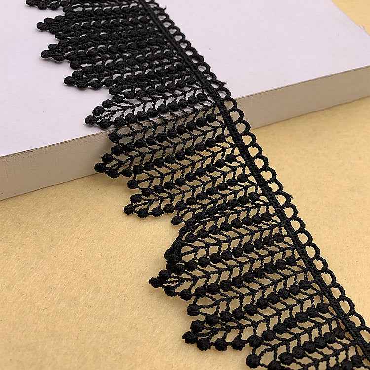 Leaf embroidery lace trim, 5.5cm, dark black with beige-toned leaf pattern, scalloped edge