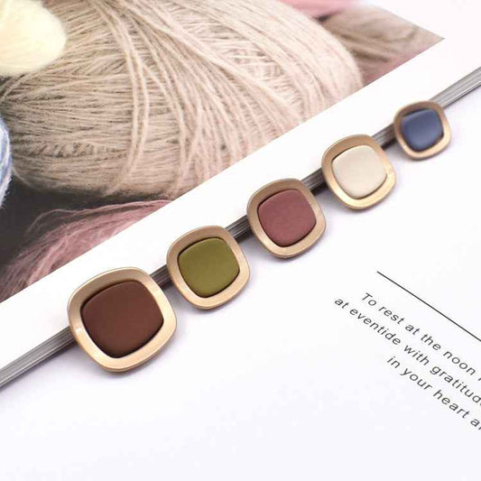 Set of square concave metal shank buttons with dark blue, green, brown, pink and white