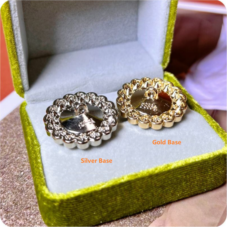 Flower rhinestone buttons: silver base with dark center, gold base with light amber center
