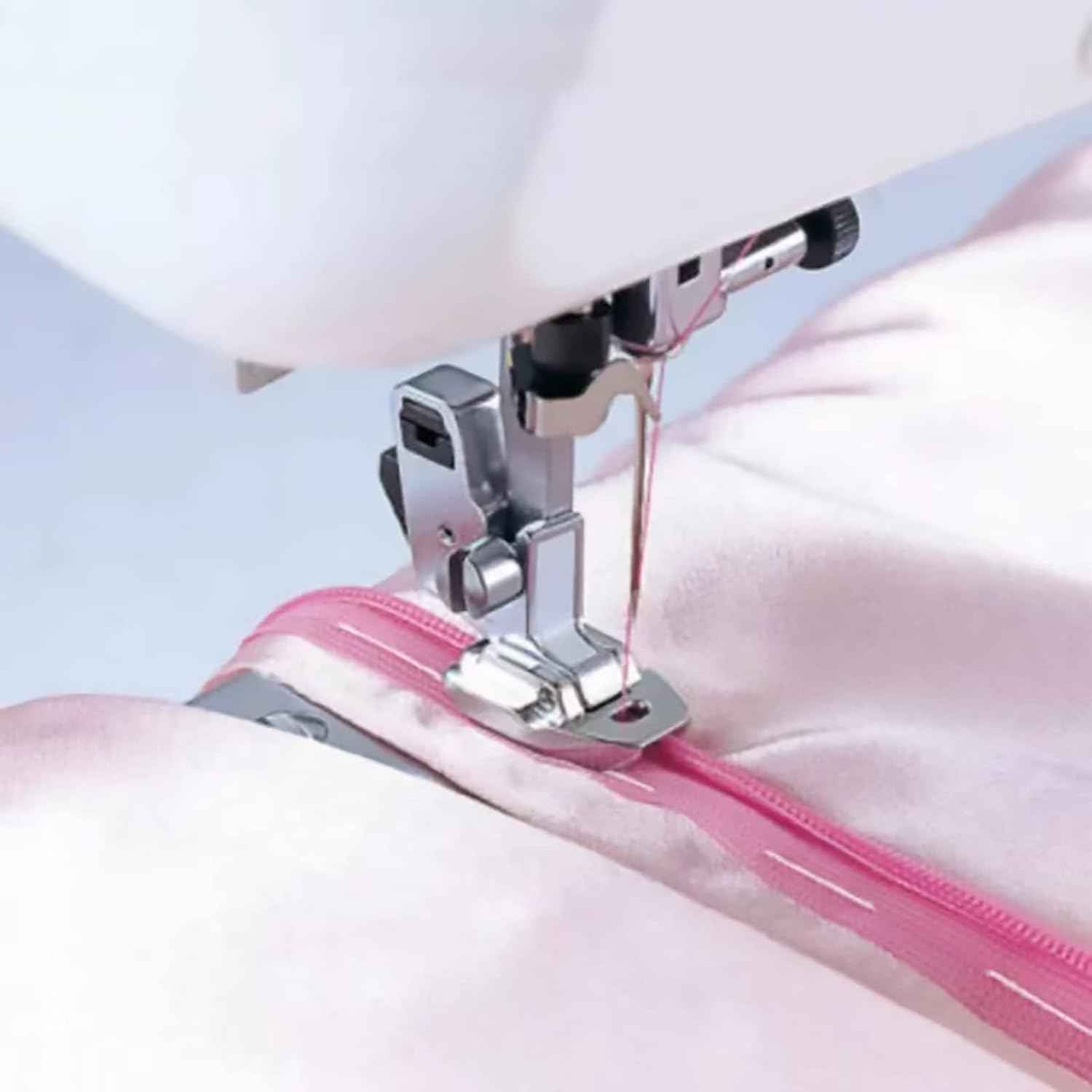 Invisible zipper sewing foot in use, stitching along a pink zipper tape
