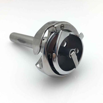 Metal sewing machine hook part with central black insert and cylindrical shaft