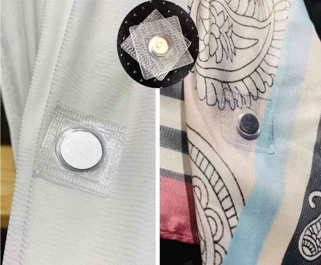 Hidden sew magnetic snap button attached to light fabric, round magnetic center visible