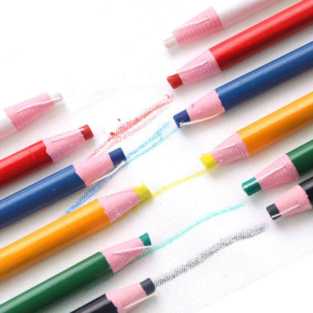 Assorted sewing marking pencils with pink tips and colored ends laid together