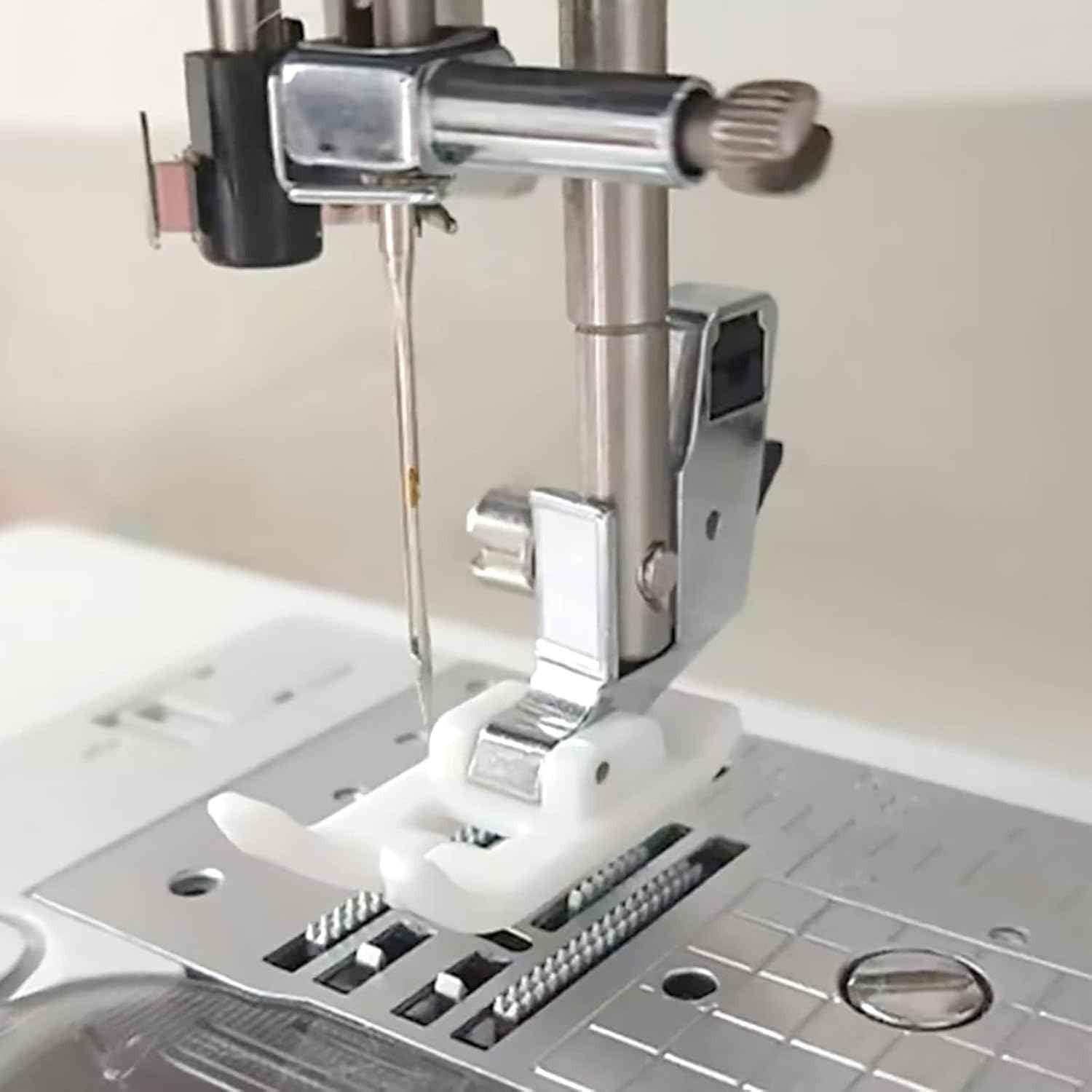 Low shank snap-on Teflon zigzag presser foot installed on a sewing machine