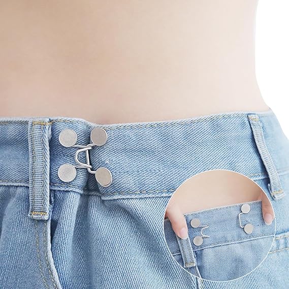 Adjustable jean waist tightener buttons on denim waistband, linked loop chain
