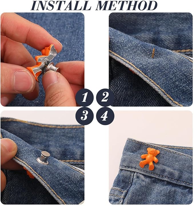 Orange bear button tightener clipped to blue denim waistband, snap placement