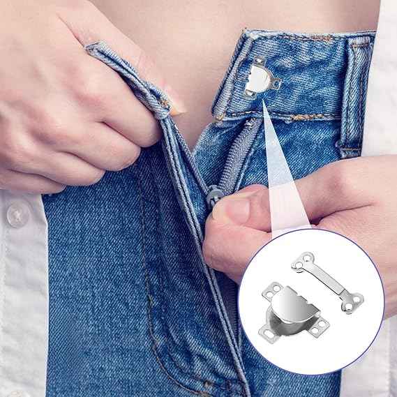 Hand sewing a trouser hook fastener onto denim waistband near the opening