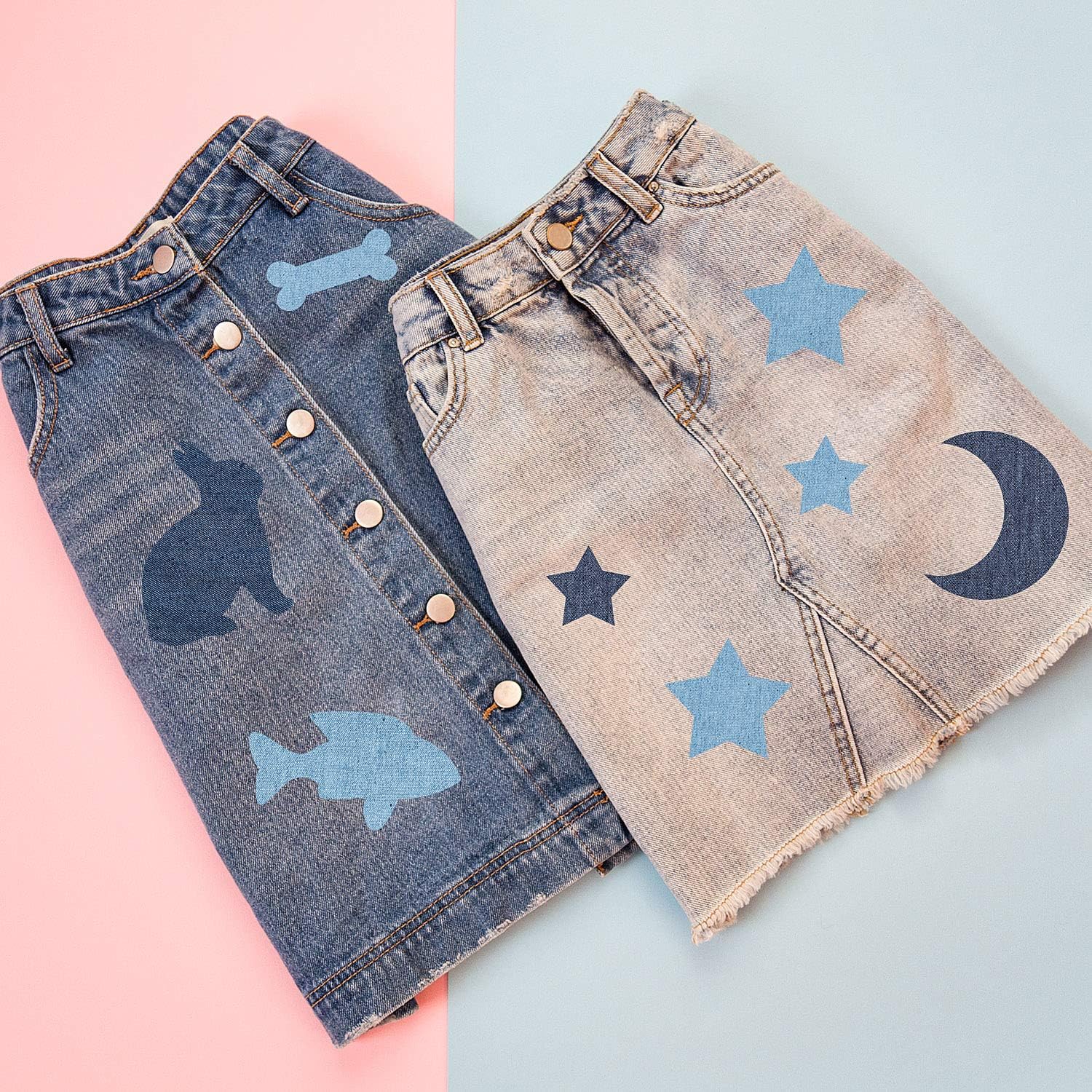 Two denim garments with iron-on patches: airplane, bone, star, moon, and heart motifs