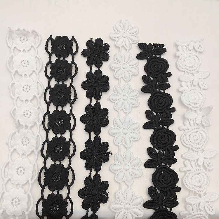 Lace trim set: white and black embroidered floral motifs on narrow scalloped trim, 1.5–2.5 cm