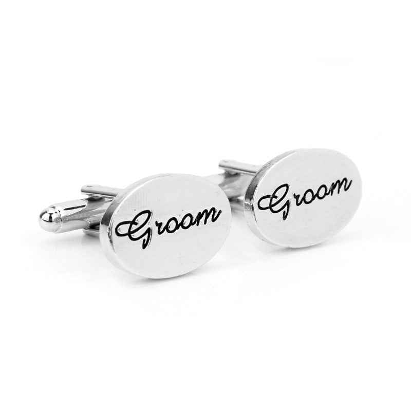 Silver oval cufflinks with “Groom” text, polished frames, 2-piece set