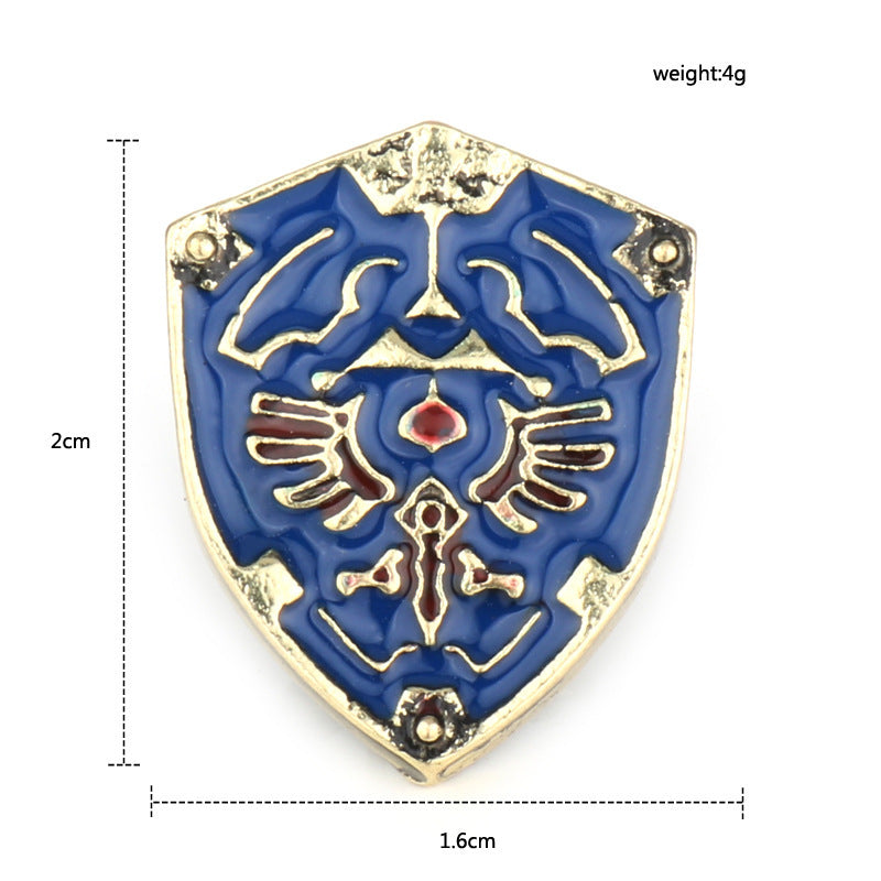 Blue shield enamel pin brooch with gold trim and red center emblem