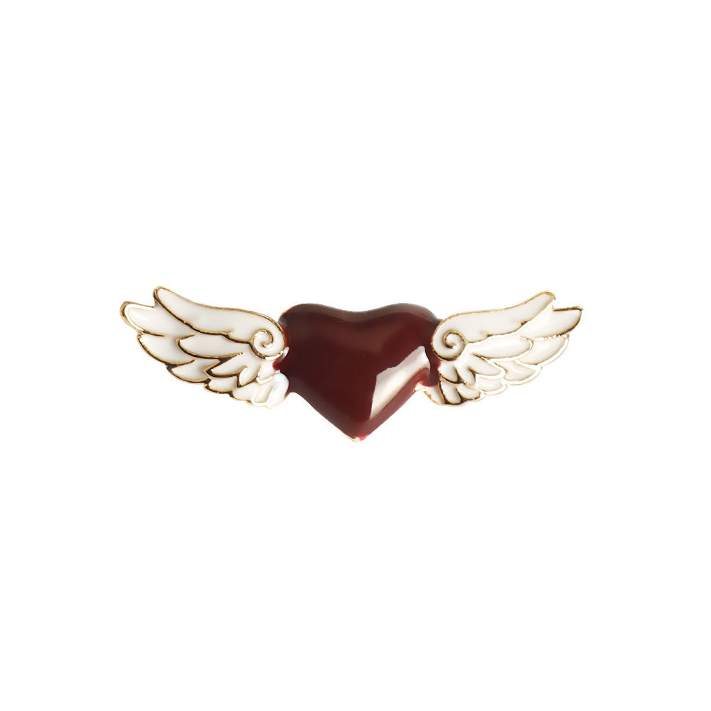 Heart and angel wing brooch pin pair: dark heart with white wings, curled details