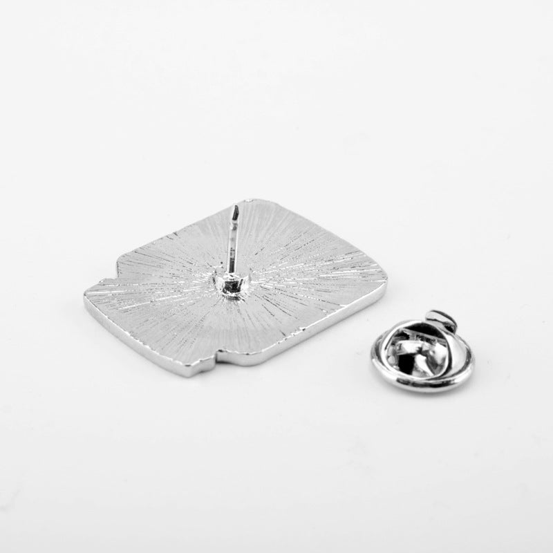 Silver-toned brooch pin back with clasp