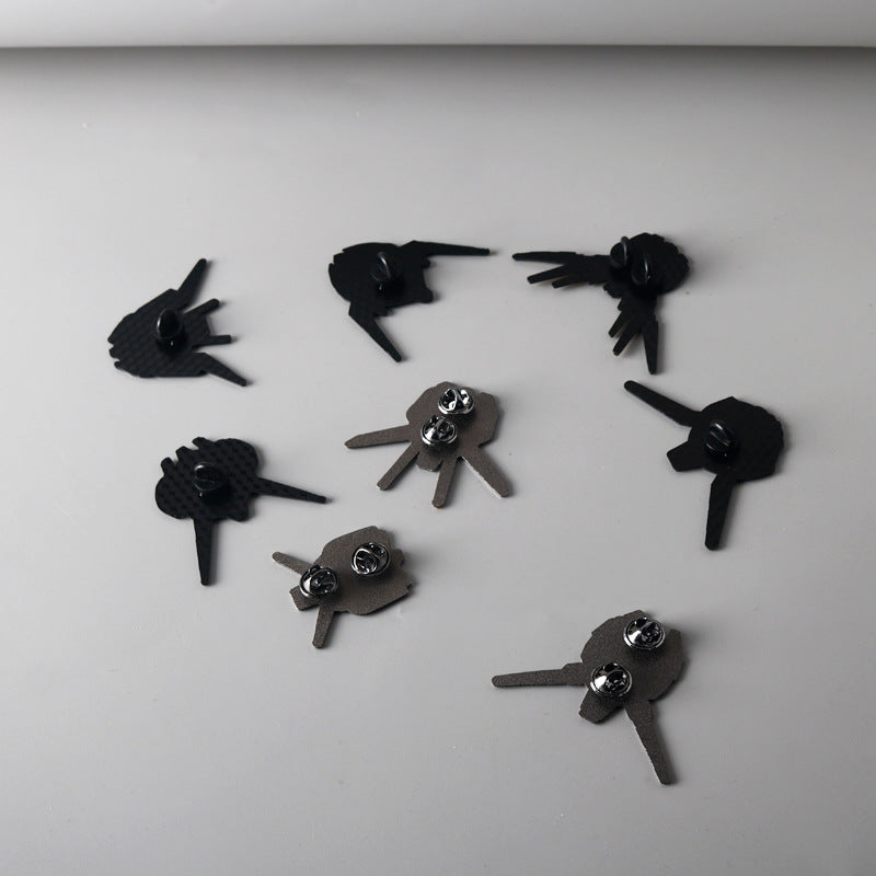 Metal badge brooch backs with pin posts in black