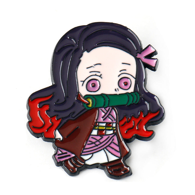 Dark-haired demon slayer girl metal brooch pin with green scarf and red flame cloak