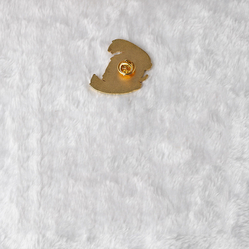 Gold metal pin backing with butterfly clasp