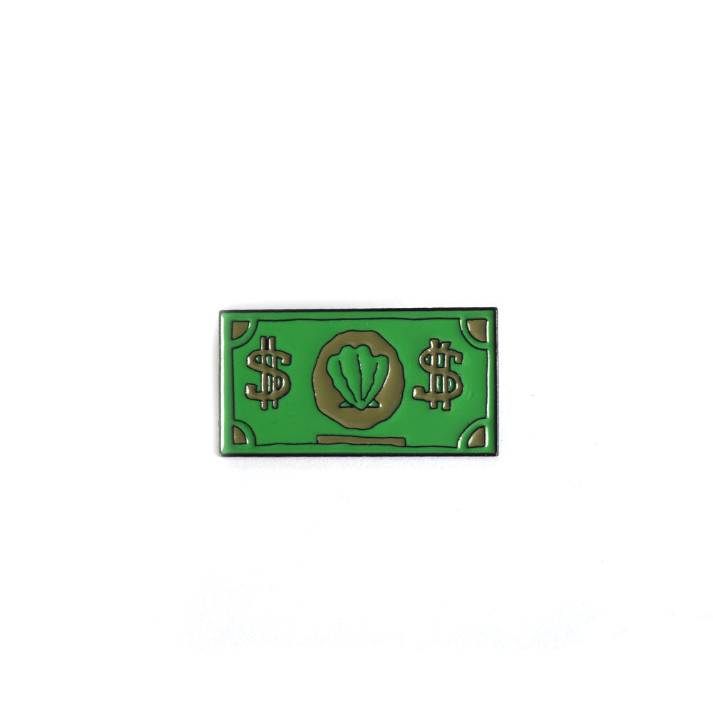Money-themed lapel pin, green rectangle with dollar signs and a shell icon