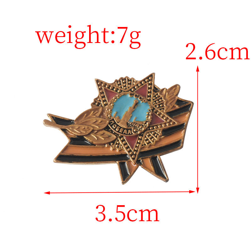 Metall-Brosche mit Stern-Emblem, türkisfarbenem Einsatz und goldenen Linien, 3,5 cm