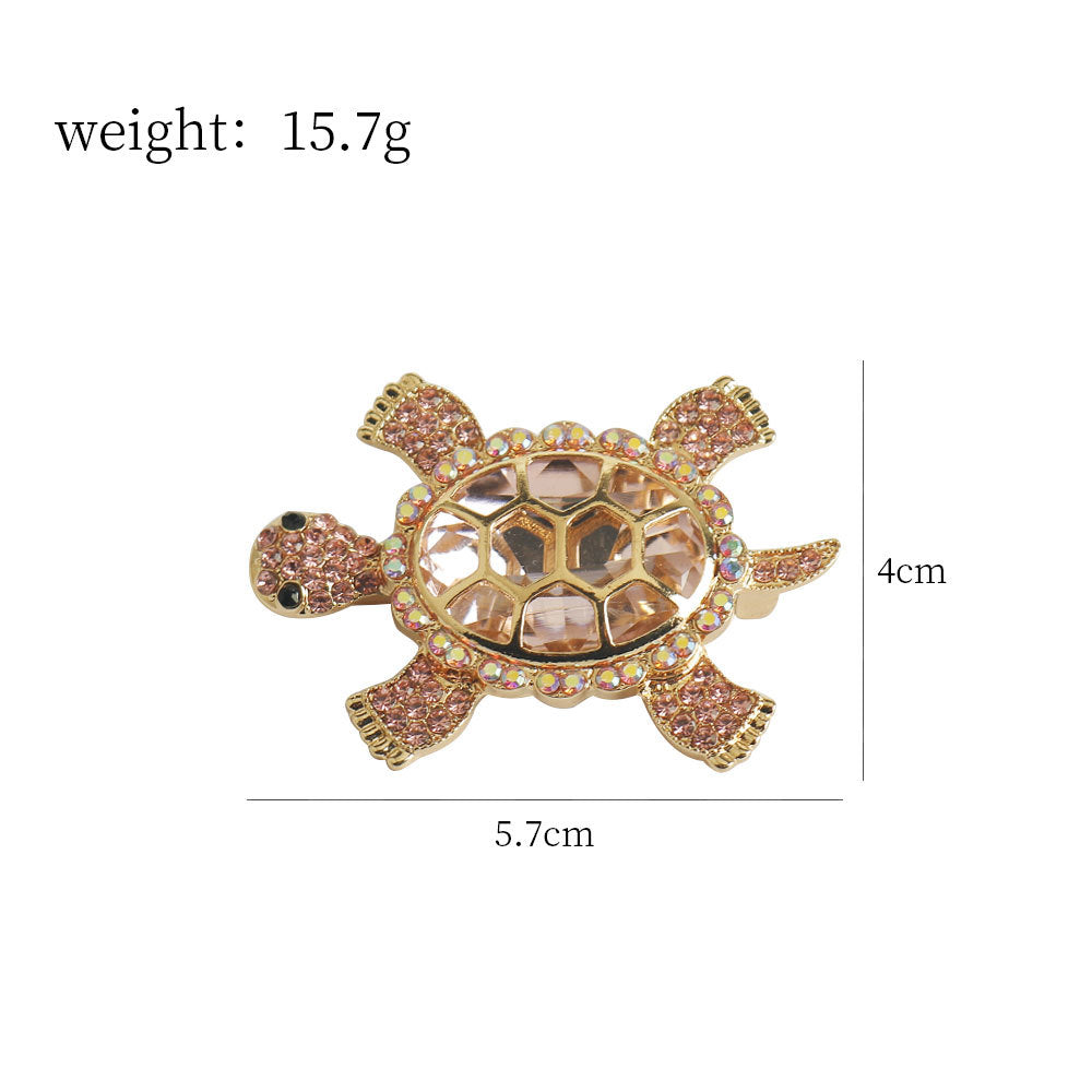 Pink glitter turtle brooch with rhinestone shell, gold frame, 5.7×4 cm shown