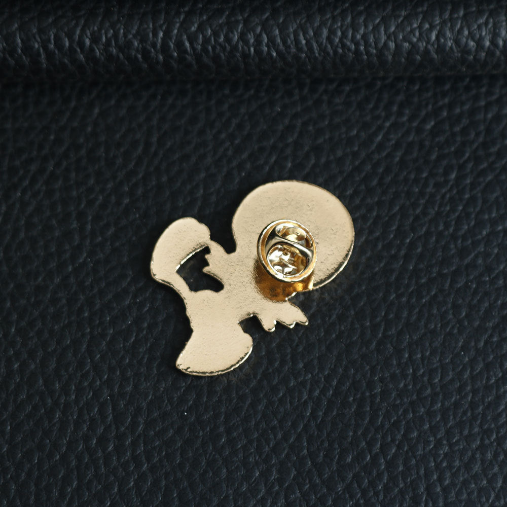 Metal pin back for Tweety badge: circular clasp and hinge, silver tone