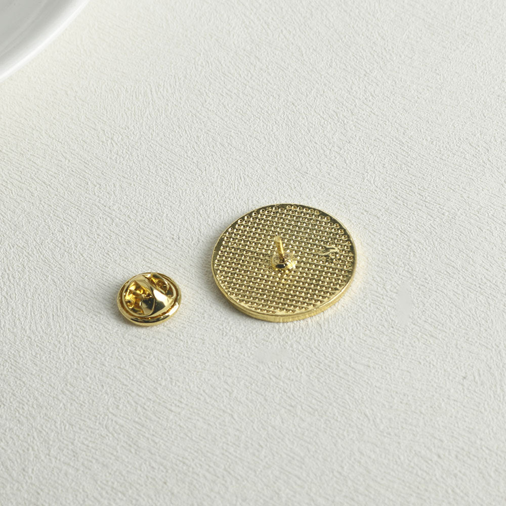 Gold-tone pin clasp back, round stud with fastening post