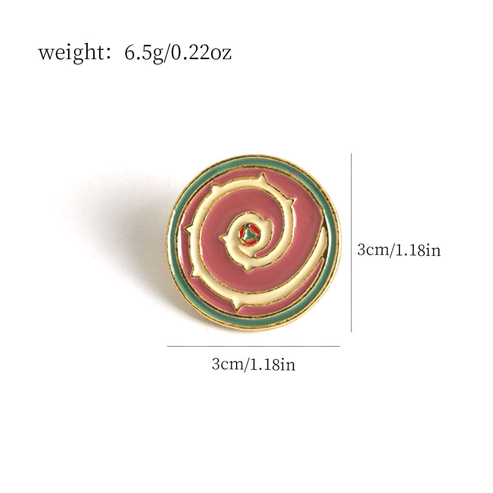 Shield brooch pin, 3 cm round enamel design; weight 6.5 g