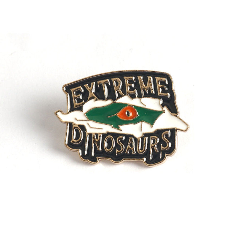 Extreme Dinosaurs enamel pin set (2): green starry badge with orange eye