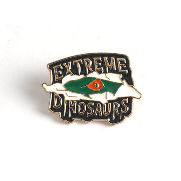 Extreme Dinosaurs enamel pin set (2): green starry badge with orange eye
