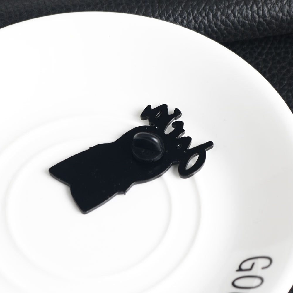 Enamel pin back with black butterfly clasp and pin post