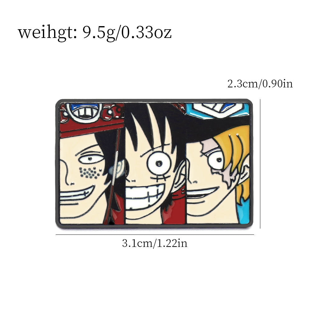 Thousand Sunny metal brooch pin rectangle: three illustrated faces, enamel look, silver border