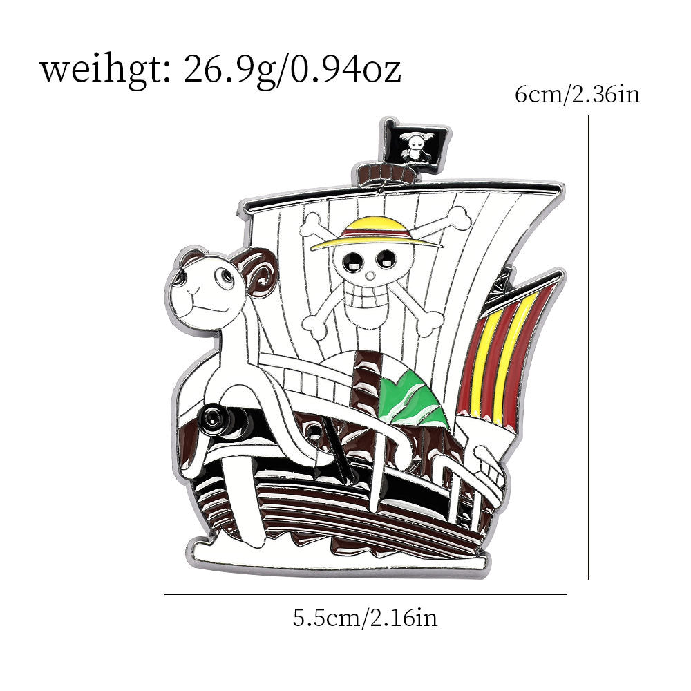 Thousand Sunny metal brooch pin close-up: ship scene with dog mascot, enamel art, silver clasp